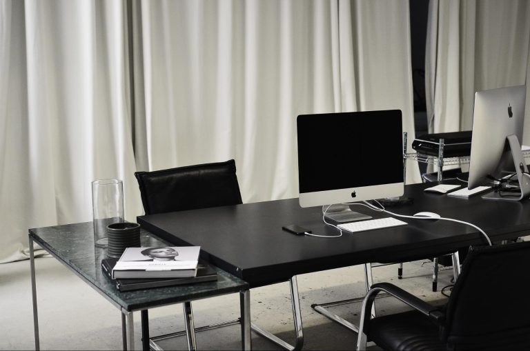 black macbook table